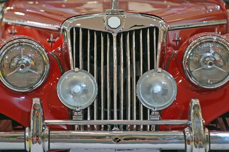 Close up of the front of an old sports carの写真素材