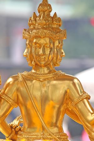 The Erawan Shrine on a busy street in the middle of Bangkokの写真素材