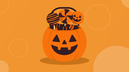 Orange pumpkin bucket with candiesのイラスト素材
