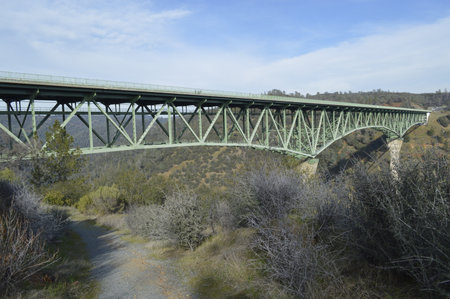 Railway bridge over the river in California, United States of Americaの写真素材
