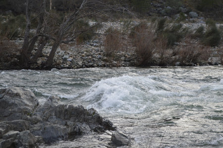 fast mountain river, waves, stonesの写真素材