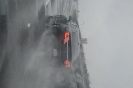 cars on the road in rainの写真素材