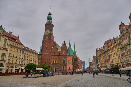 Wroclaw, Poland - April 12, 2023: The old city square with the town hall building.のeditorial素材