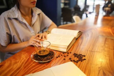 Coffee concept for design and advertisement: Coffee cup, coffee beans, coffee break