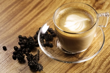 Coffee concept for design and advertisement: Coffee cup, coffee beans, coffee break