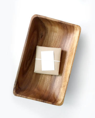 Wooden tray in white backgroundの写真素材