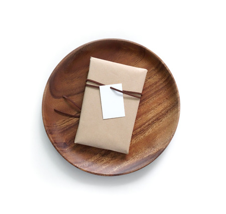 Gift boxes in the wooden tray with white backgroundの写真素材