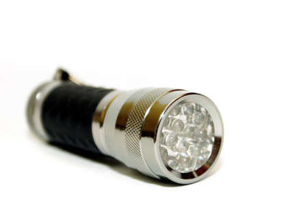 Chromed Black Flashlight on white background
