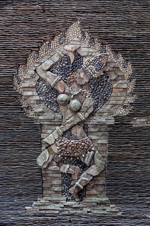 A picturesque stone wall mosaic of a woman in Nha Trang Vietnam.の写真素材