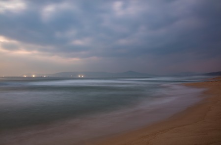 A misty morning slow exposure looking out over the south China sea in Vung Lam Bay Vietnam.の写真素材