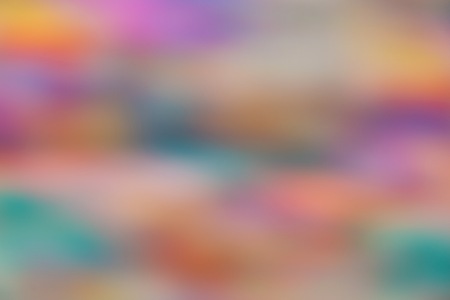 Abstract motion and out of focus blur of vibrant rainbow pastel colours.の写真素材