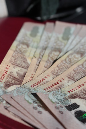 blurry and select focus of close up thai  banknotes