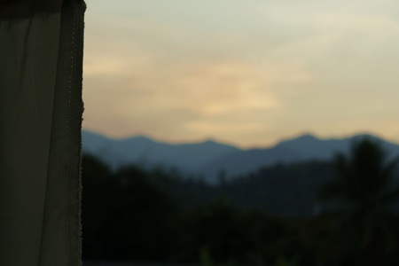 sunrise behind mountainsの写真素材
