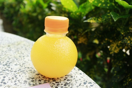 a bottle with orange juice