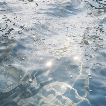 Water surface with drops. Abstract background and texture for design. Copy space.