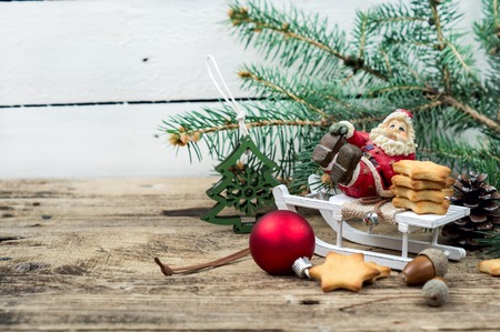 Santa Claus on a sled Christmas toyの写真素材