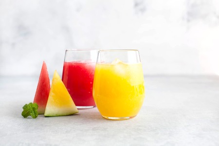 Watermelon fresh juice of red and yellow watermelonの写真素材