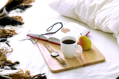 The bed in the bedroom, morning, Breakfast, coffee, sleeping cat