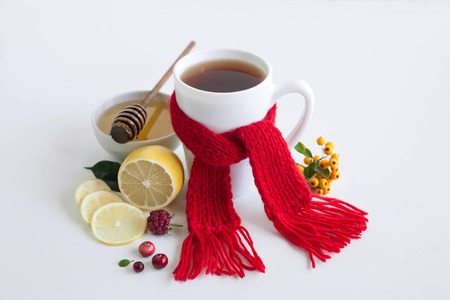 A hot drink from the flu with lemon honey raspberries cranberriesの写真素材