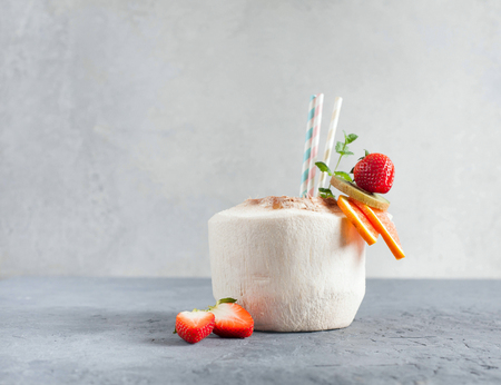 Coconut cocktail with fresh fruitの写真素材