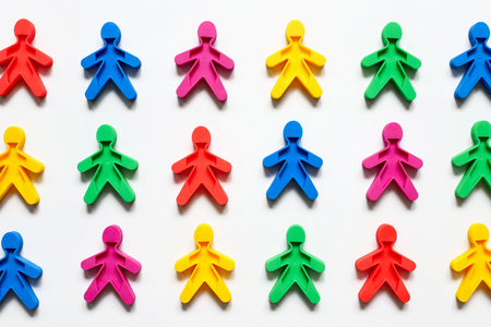 Friendship of peoples is a symbol of colored men on a white background.
