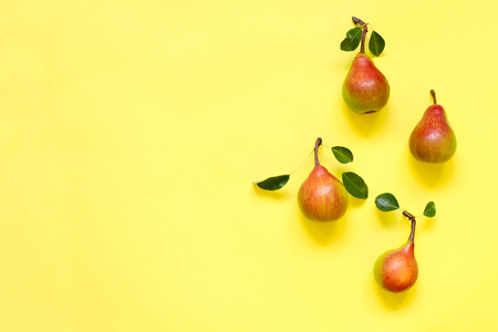 Pears on a yellow backgroundの写真素材