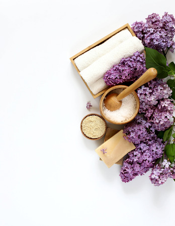 Spa and massage products with lilac on whiteの写真素材