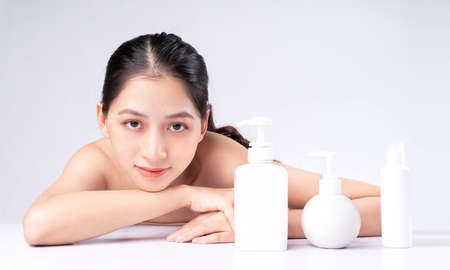 Attractive young Asian woman with youthful skin. Facial care, facial treatment, woman beauty skin isolated on white background. cosmetology, skin beauty and cosmetic conceptの写真素材
