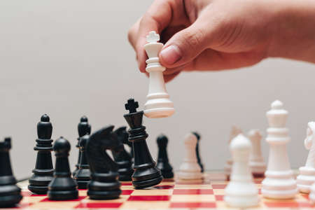 image of chess pieces on a chessboardの写真素材