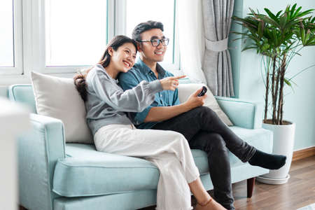 Asian couple arguing at homeの写真素材