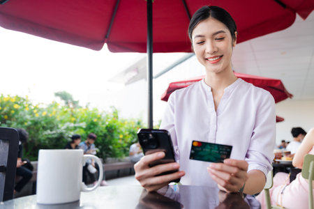 Portrait of beautiful asian woman sitting at cafe