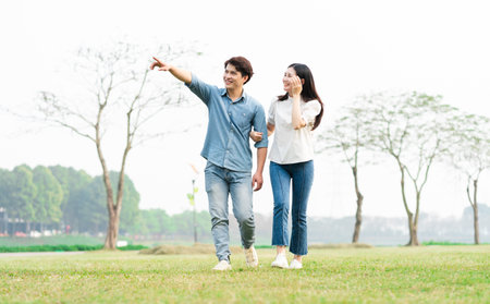 image of a happy asian couple in the parkの写真素材