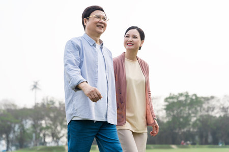 Elderly Asian couple in the parkの写真素材