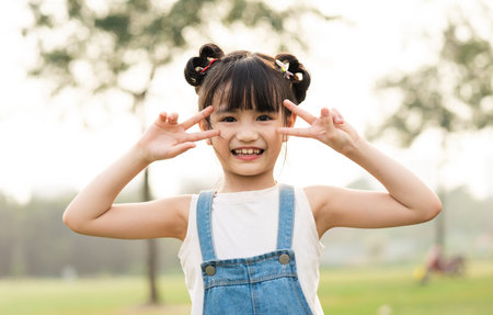 cute asian girl's feet in the parkの写真素材