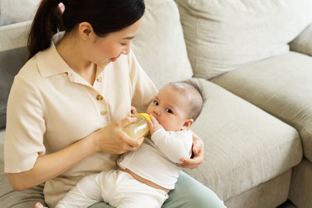 happy mother and son image at homeの写真素材