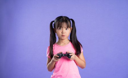 beautiful asian girl portrait posing on purple background