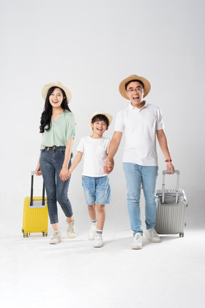 a family posing on a white backgroundの写真素材