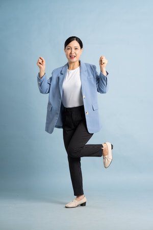 full body photo of a middle-aged businesswomanの写真素材