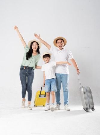 a family posing on a white backgroundの写真素材