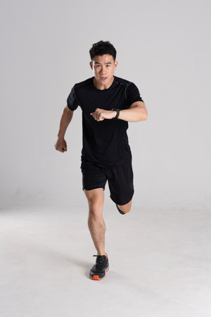 Image of an Asian runner, isolated on white backgroundの写真素材