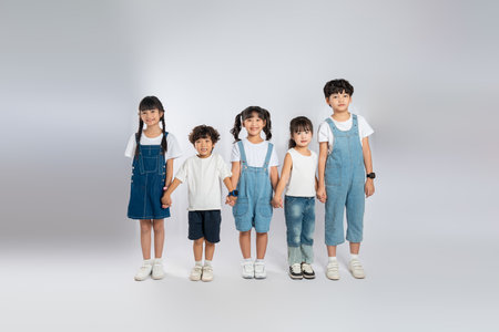 group image of cute asian kids posing on white backgroundの写真素材