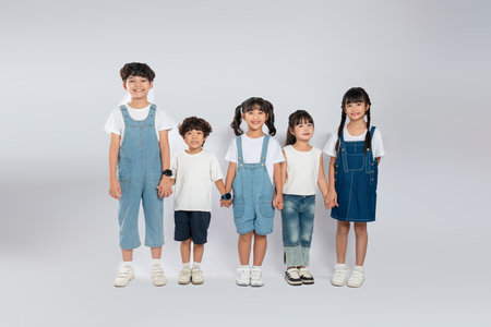 group image of cute asian kids posing on white backgroundの写真素材