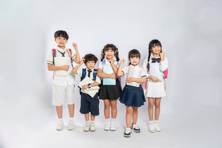 group image of cute asian kids posing on white backgroundの写真素材