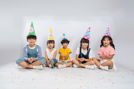 group image of cute asian kids posing on white backgroundの写真素材