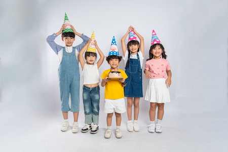 group image of cute asian kids posing on white backgroundの写真素材