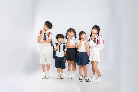 group image of cute asian kids posing on white backgroundの写真素材