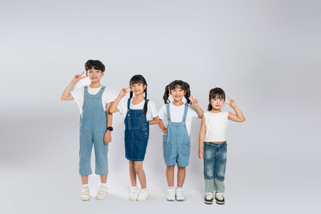 group image of cute asian kids posing on white backgroundの写真素材