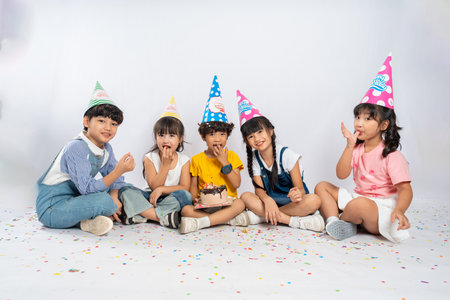 group image of cute asian kids posing on white backgroundの写真素材