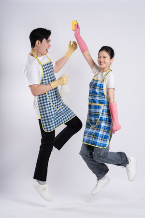 Image of Asian couple posing on white backgroundの写真素材