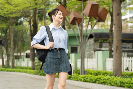 Portrait of female college student in the parkの写真素材